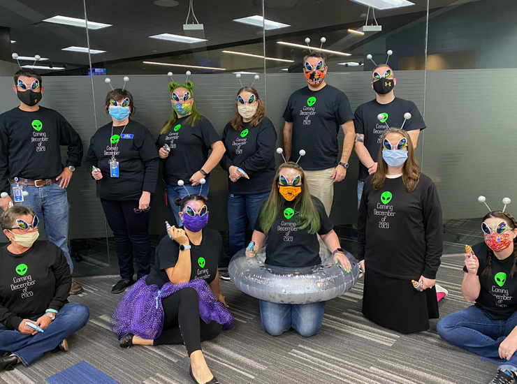 ORNL FCU staff in Halloween alien costumes