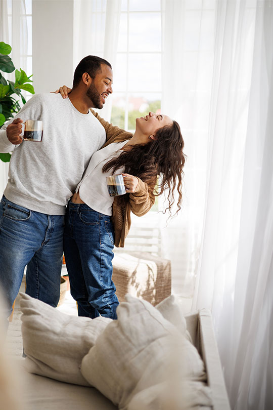 carefree-couple-enjoying-coffee
